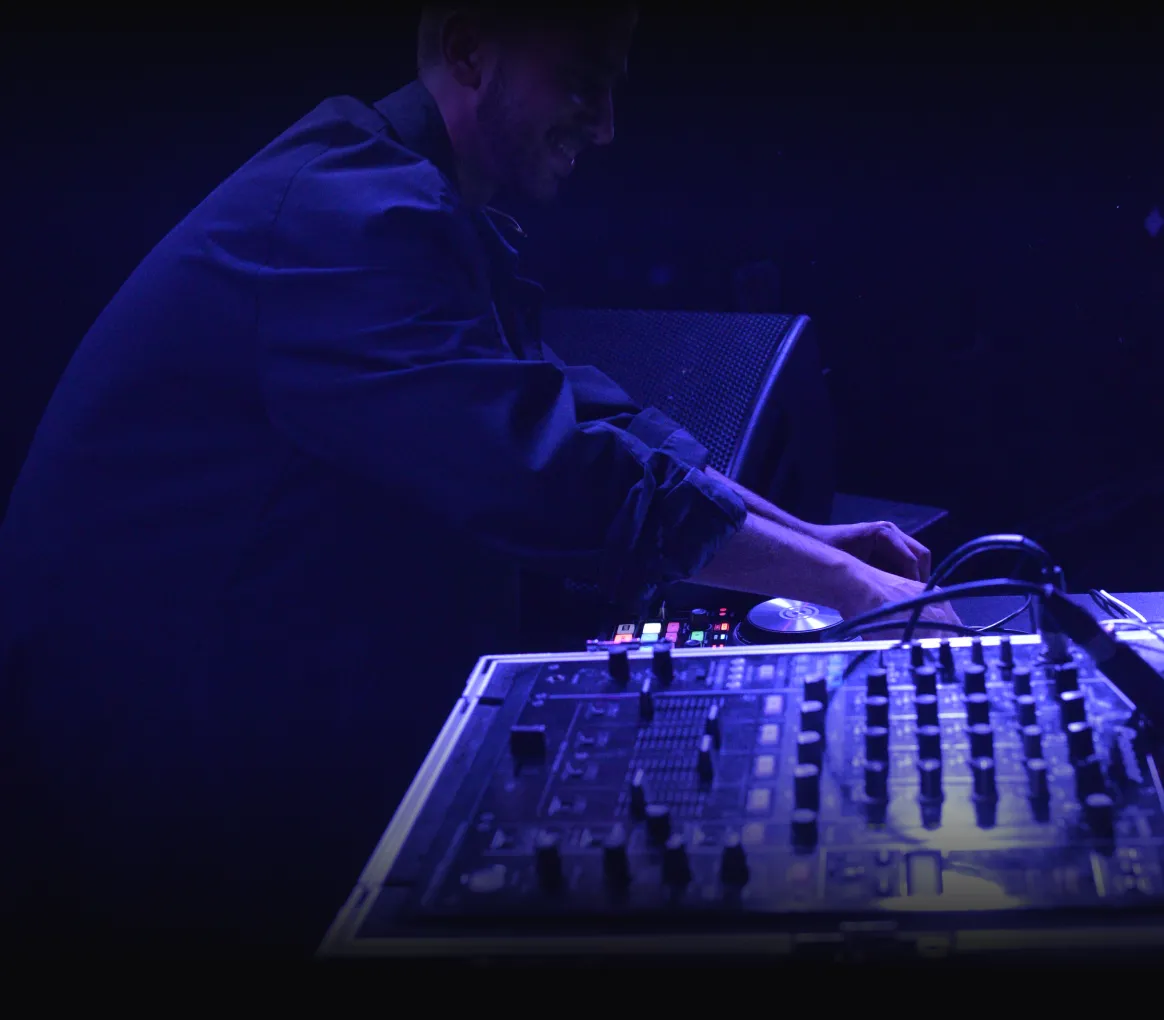 Artist performing live on stage at a GigFinesse gig